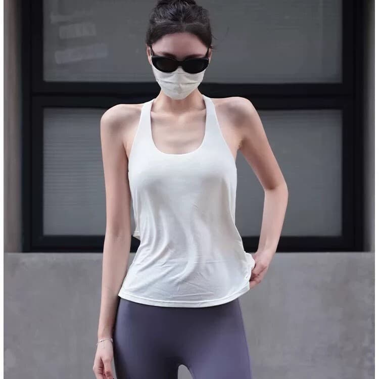 Mulheres cruzadas com almofada no peito Top esportivo para corrida Yoga Wear Camisa sem mangas Colete de Fitness
