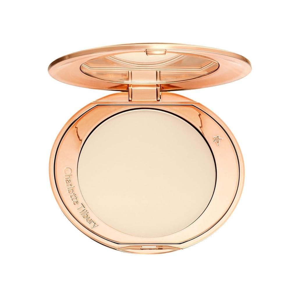 Pó Fixador Flawless Airbrush da Charlotte Tilbury - Pó compacto para maquiagem facial que reduz o brilho.
