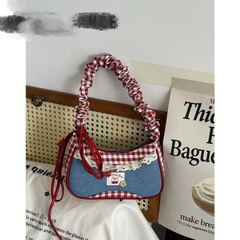 Bolsa mensageiro único novo estilo Commuter ombro 2026 estilo saco xadrez pano pequeno quadrado saco feminino quente