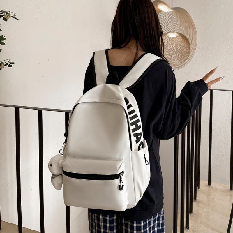 Mochila leve de cor sólida feminina versão coreana menina pequena mochila masculina feminina grande capacidade estudante