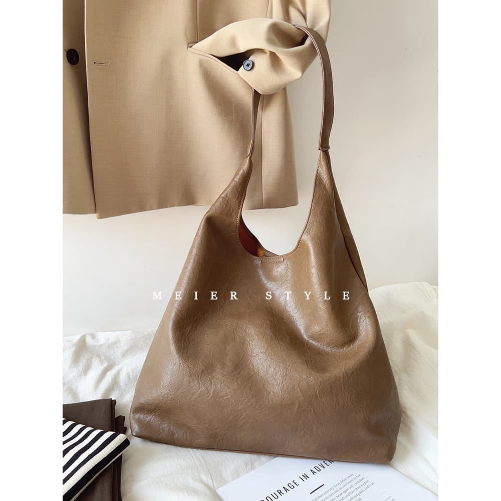 Estilo coreano chique Retro bolsa de couro macio grande capacidade bolsa de ombro axilas textura bolsa feminina criança