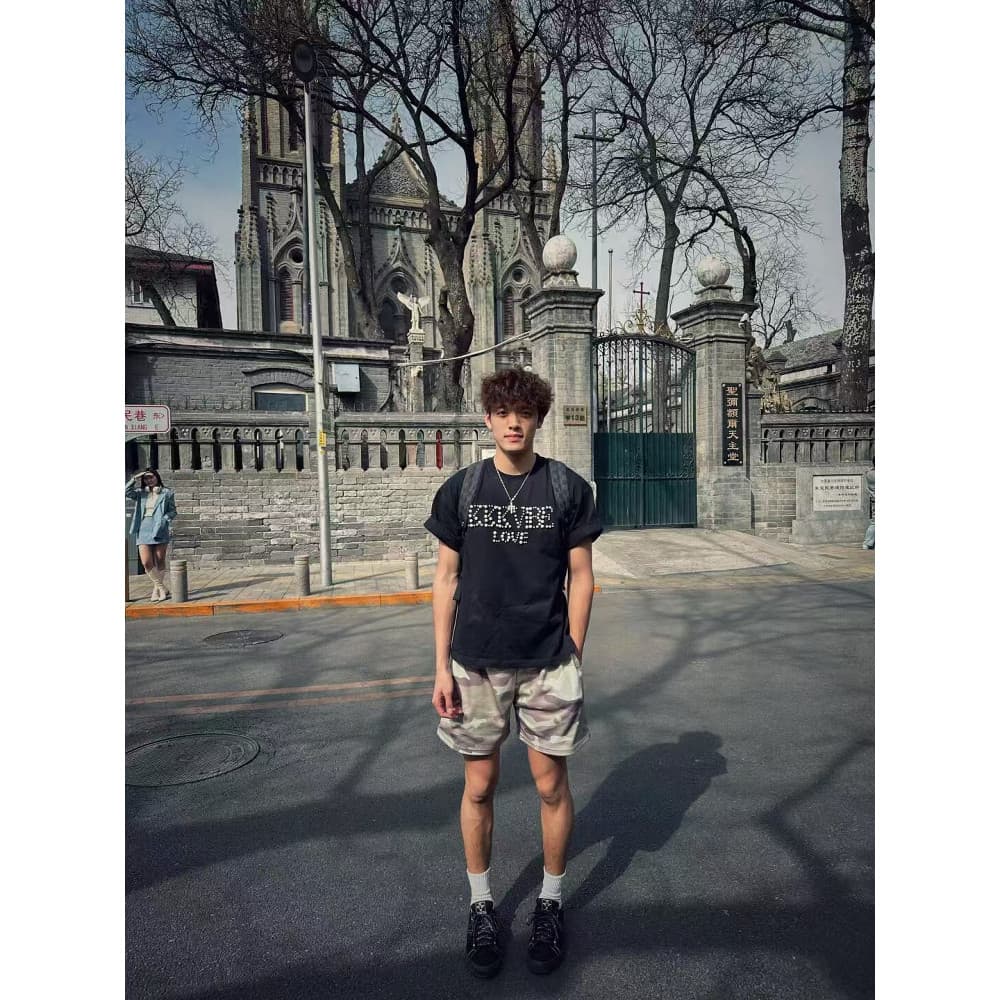 Verão Retro americano camuflagem malha quarto Shorts masculino na moda Casual solto All-Match na altura do joelho calças