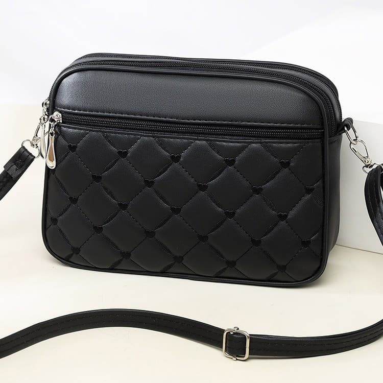 Esta elegante e requintada bolsa feminina é um novo modelo de verão para 2024, oferecendo versatilidade com um design co