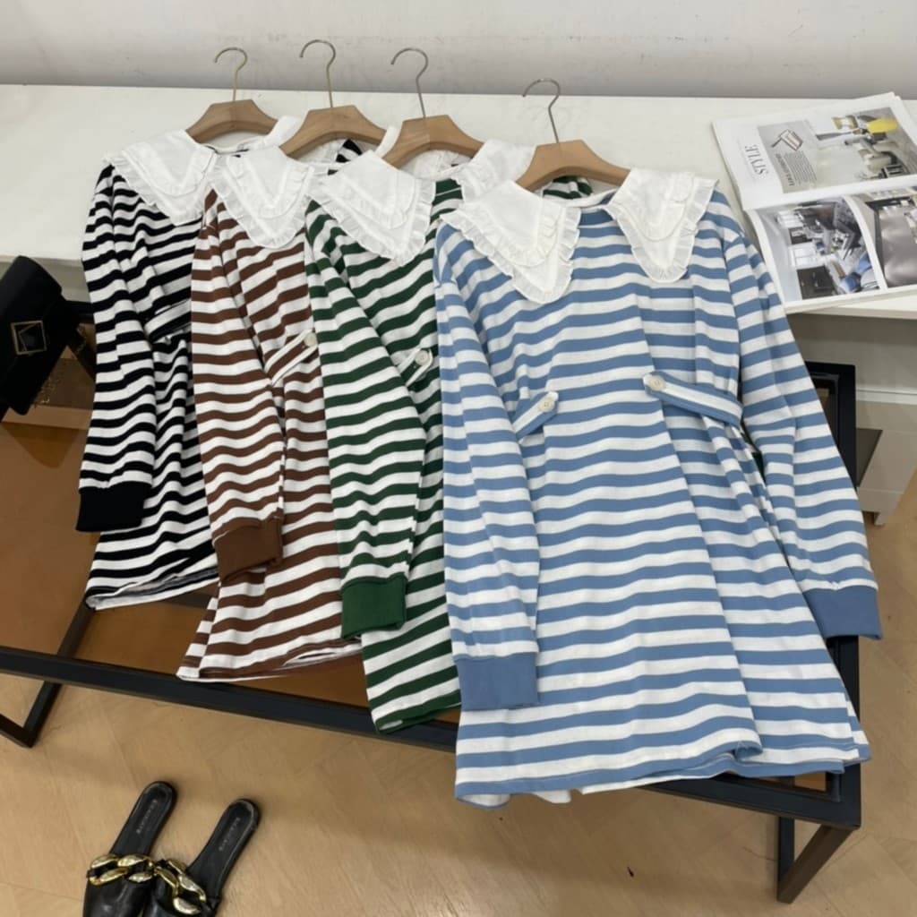 Vestido listrado redutor de idade com gola de boneca feminino 2026 novo estilo solto cobrindo carne aparência mais fina