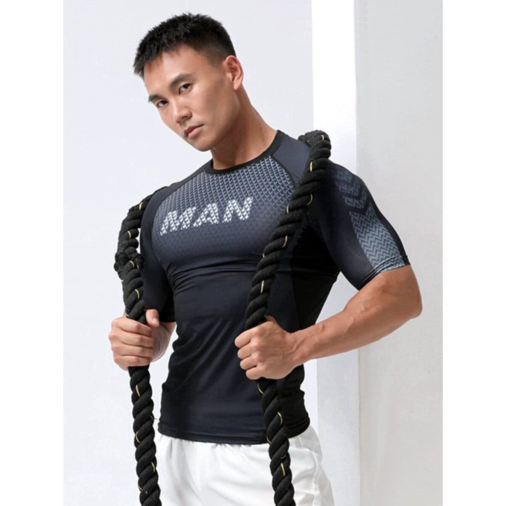 Nova moda collants alta elástica de manga curta roupas de Fitness masculinas roupas de secagem rápida esportes camiseta