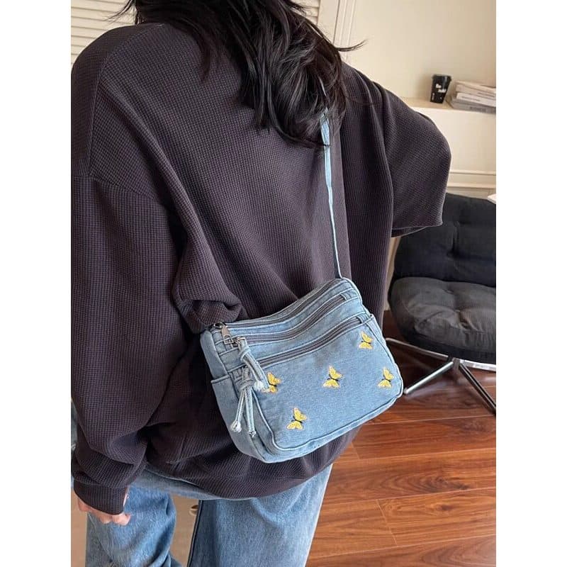 bolsas femininas de ombro 2026 novo produto simples All-Match pequeno estilo de acampamento ajustável de um ombro mensag