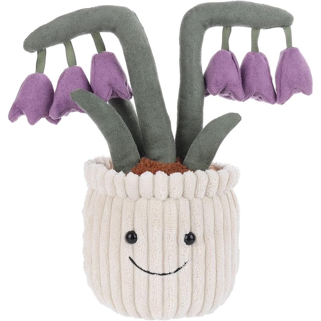 Brinquedo de pelúcia macio de cordeiro cor de damasco com flor de convallaria, colocado em um vaso de flores roxo, um br