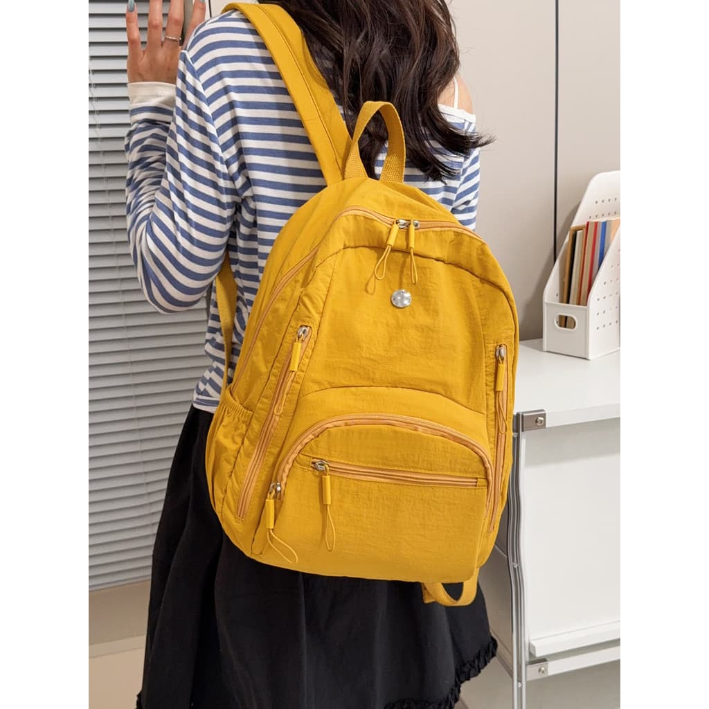 Leve japonês mochila feminina 2026 novo estilo repelente de água Multi-bolso Commuter mochila estudantes universitários