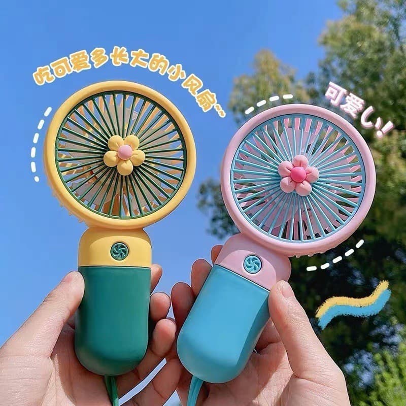 Nova flor mini portátil pequeno ventilador verão dos desenhos animados mini portátil de alta eficiência sensor de gelo v