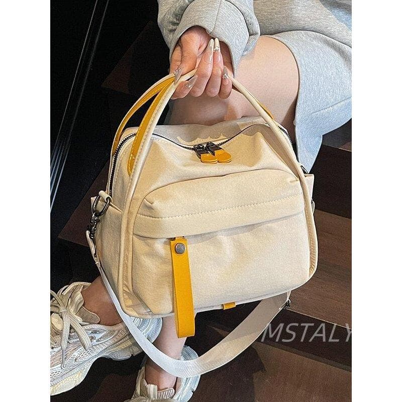 Bolsa de ombro japonesa de pano de Nylon 2026 novo estilo Commuter bolsa Casual All-Match leve bolsa feminina de corpo c