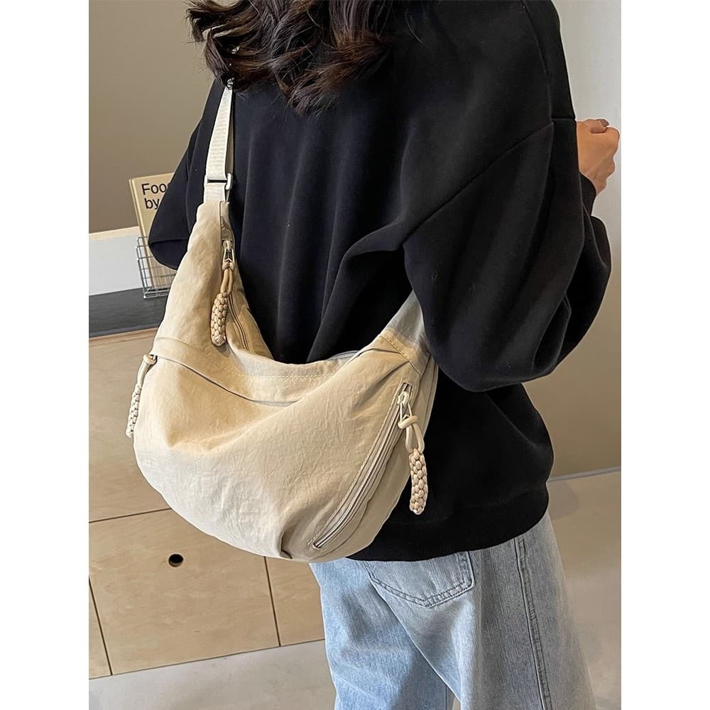 Bolsa mensageiro francesa feminina 2026 novo estilo bolsa de bolinho feminina bolsa de grande capacidade feminina Commut