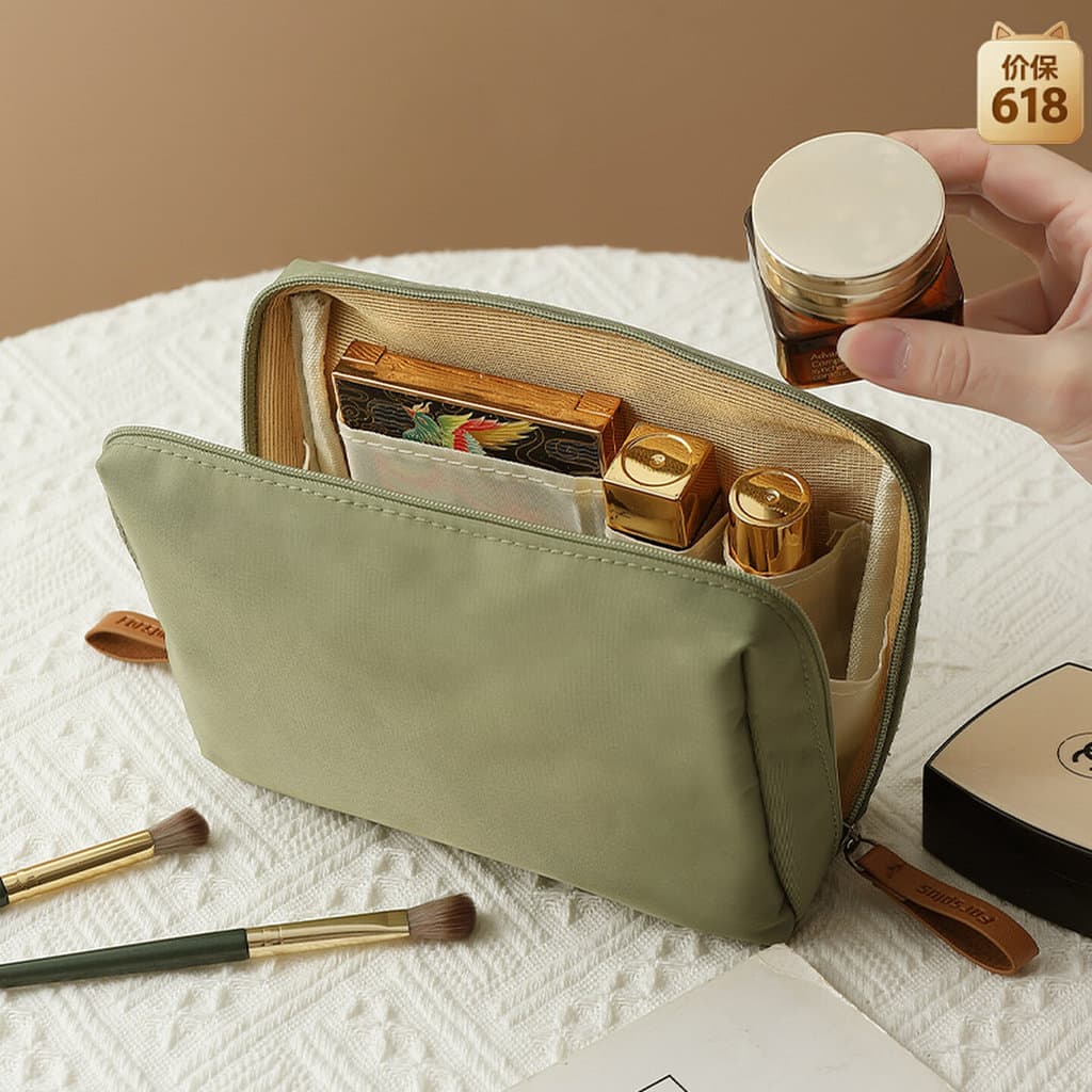 Saco cosmético feminino portátil 2026 novo estilo viagem Outing portátil pequeno saco de armazenamento de batom cosmétic