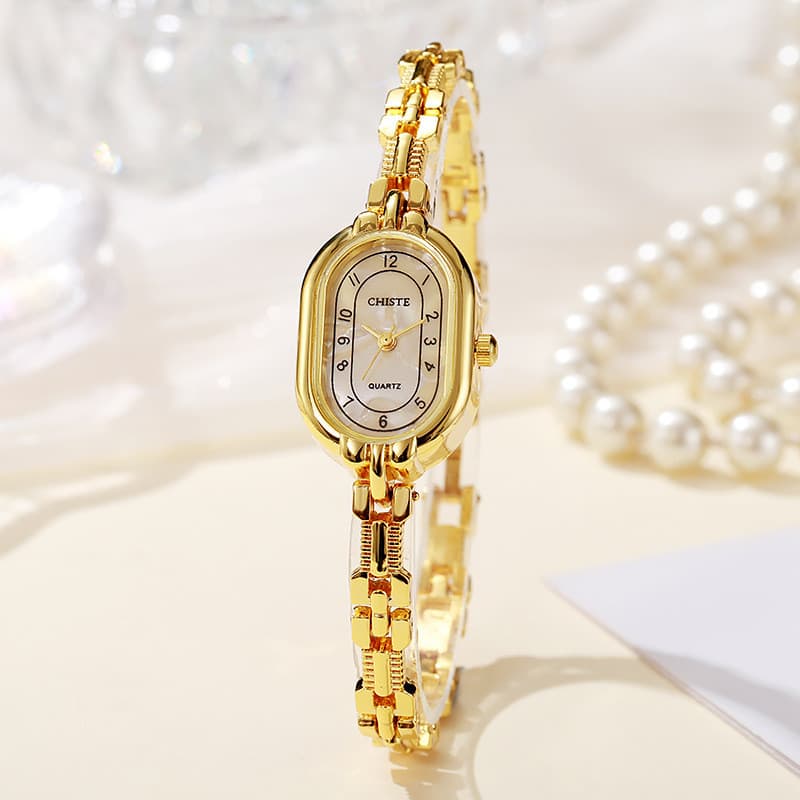 Relógio feminino novo produto Retro Oval relógio feminino nicho High-End sentir Fritillary pulseira relógio moda senhora