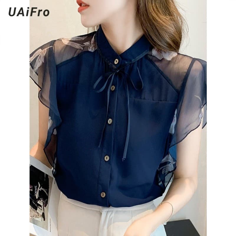 Camisa de Chiffon sem mangas feminina solta 2026 verão redução de idade camisa de renda capa barriga flor cor babados to