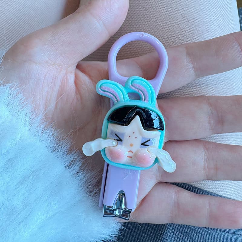 Cortador de unhas portátil, em aço inoxidável, com design de personagem de desenho animado fofo, adequado para uso domés