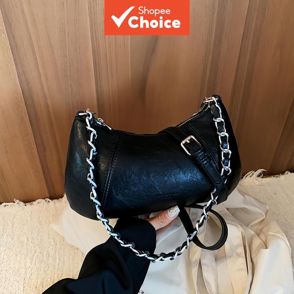 Bolsa tiracolo super moderna e elegante com alça para ombro, estilo baguete, ideal para uso casual.
