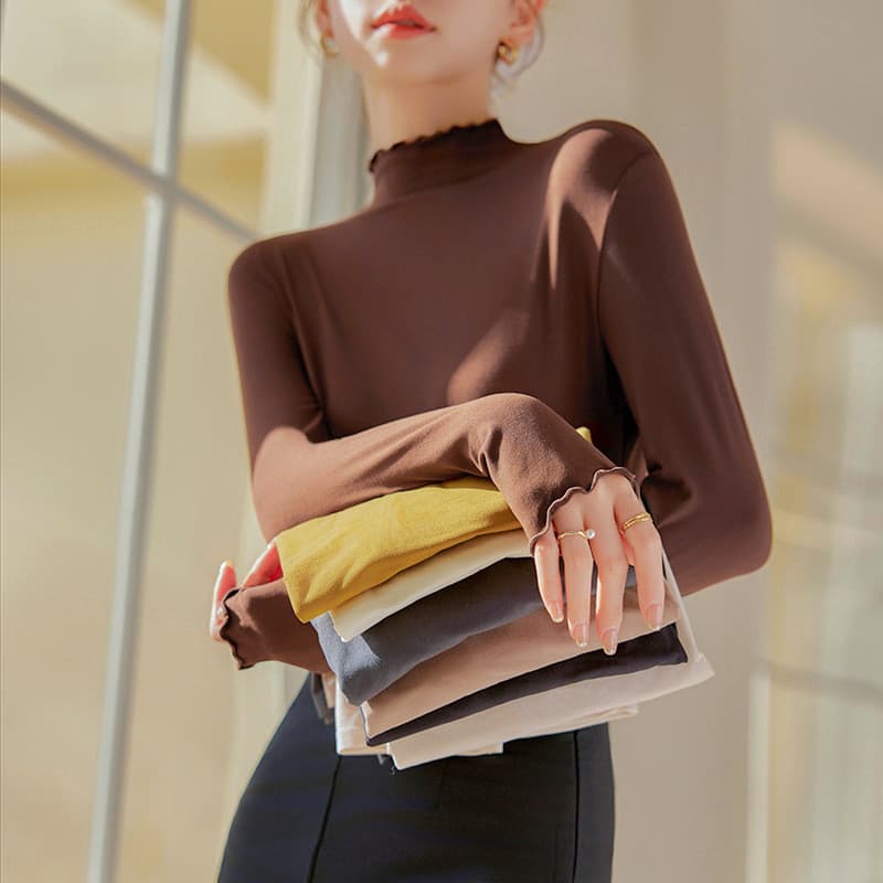 Nova camisa de base com bainha franzida para mulheres, modelo slim-fit de manga longa para o outono e inverno.