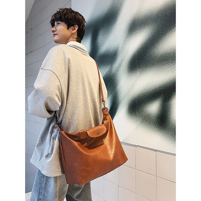 High-End Retro grande capacidade saco feminino 2026 novo estilo Commuter mochila masculina de um ombro portátil sacola