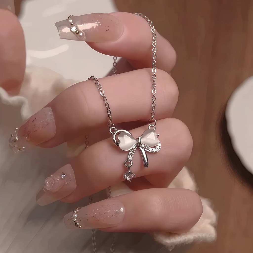 Colar de borla com laço de olho de gato feminino estilo ins nicho Design menina coração clavícula corrente