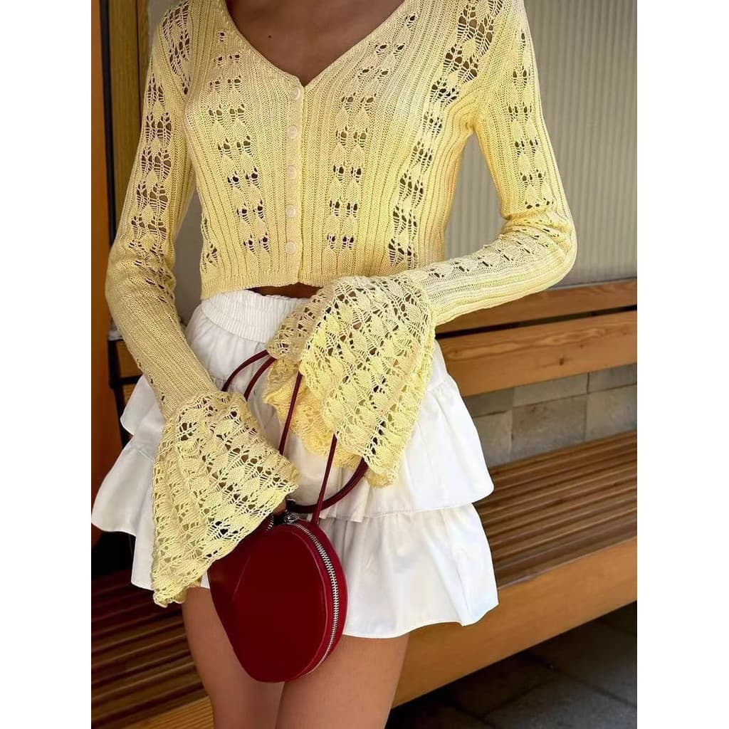 Cardigan de malha oca2026 novo estilo oco malha Cardigan feminino manga comprida com decote em V curto topo