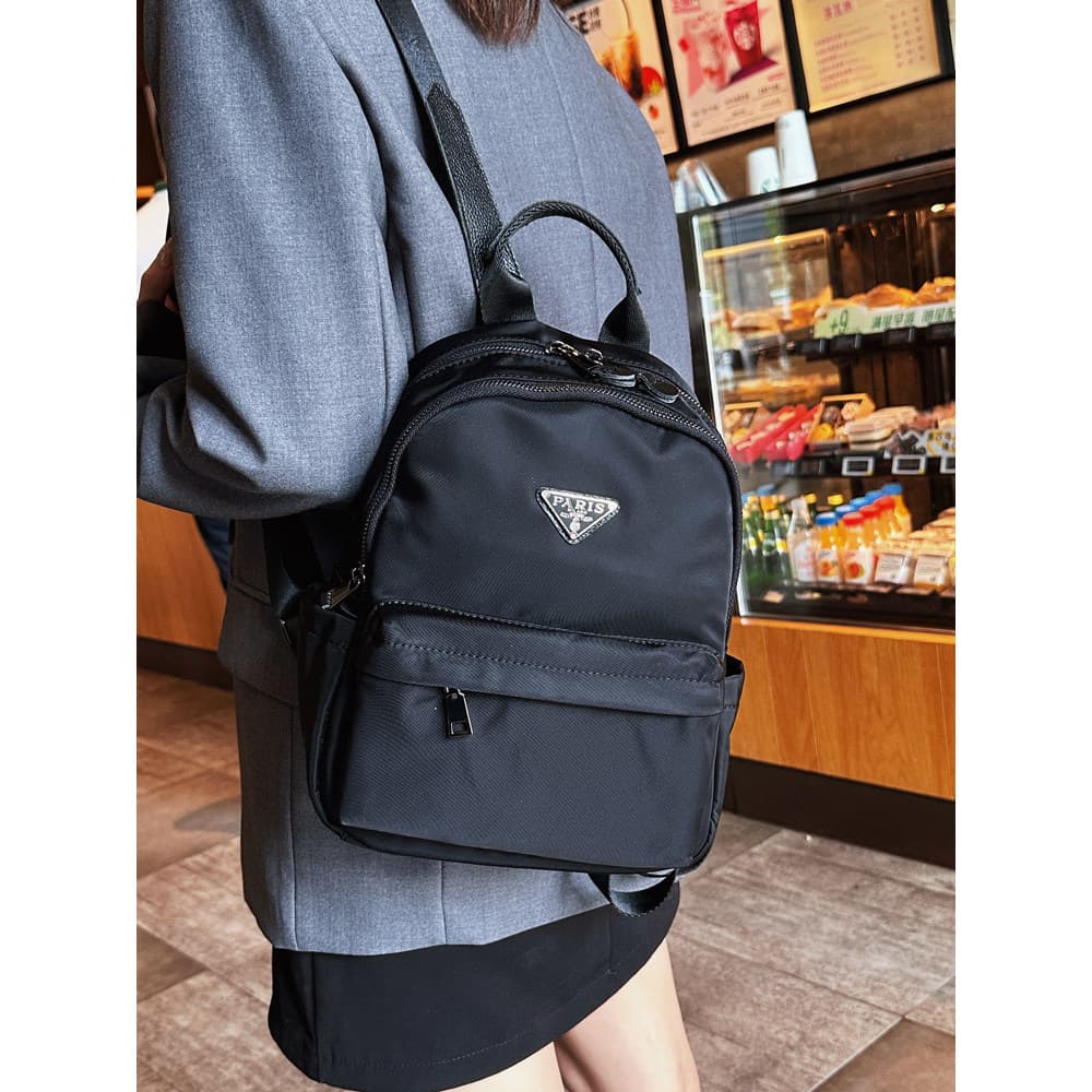 High-End saco de viagem pequena mochila feminina 2025 novo estilo moda mochila luz All-Match Multi-compartimento saco de