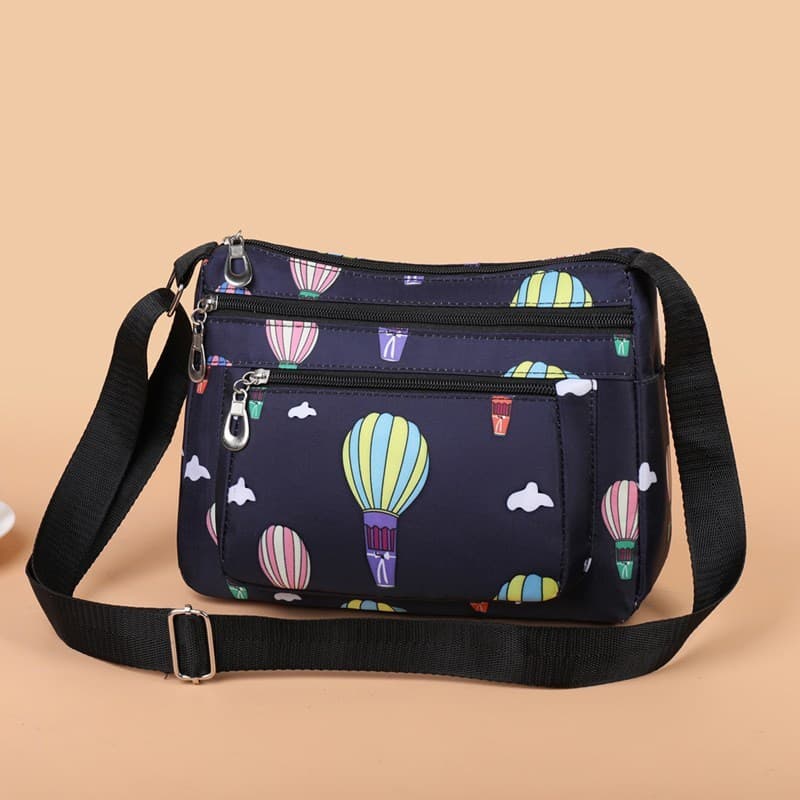 Bolsa mensageiro feminina pequena bolsa novo estilo versão coreana Oxford pano bolsa de lona Casual All-Match esportes v
