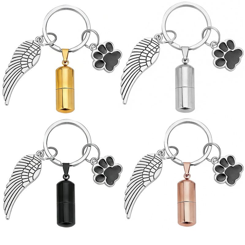 Pingente cilíndrico de aço inoxidável com design de pata de cachorro e asa para cinzas de animais de estimação, chaveiro