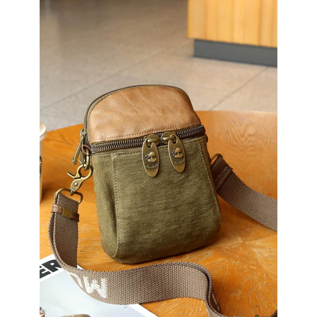 Outono inverno Retro Design nicho telefone móvel pequena bolsa de ombro 2026 novo estilo bolsa de lona moda couro Cross-