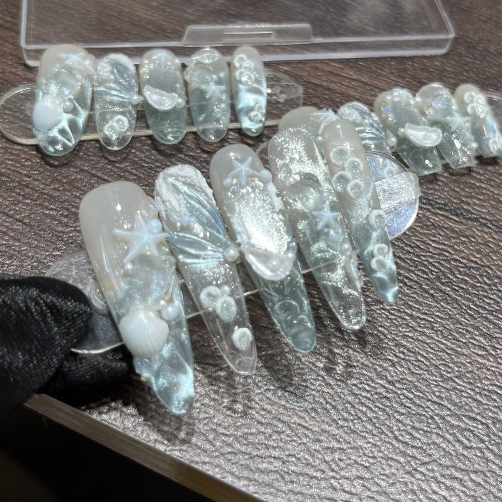 Unhas postiças artesanais de verão com tema marítimo, peças de unhas pintadas à mão com estrelas-do-mar e efeito olho de