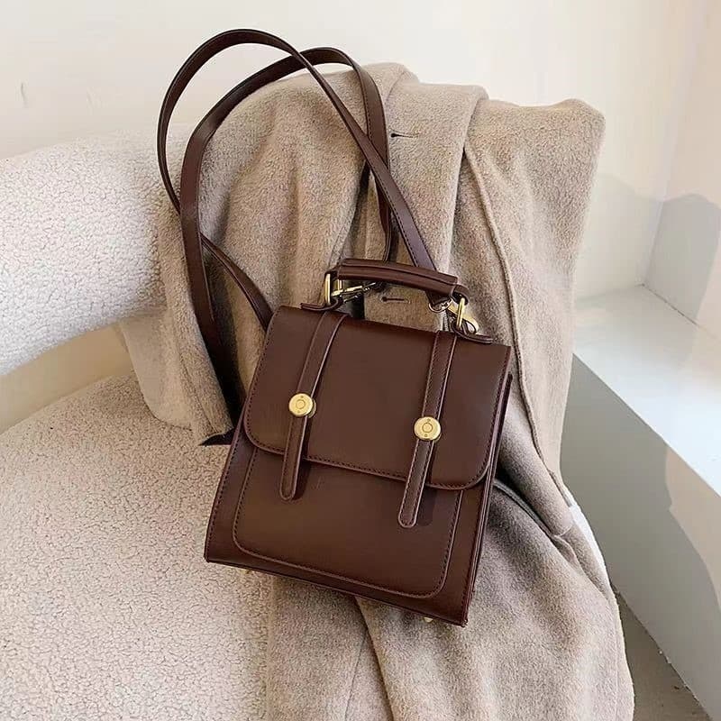 Coreano coreano mochila feminina 2026 novo estilo na moda Retro estilo Preppy mochila multifuncional computador saco de
