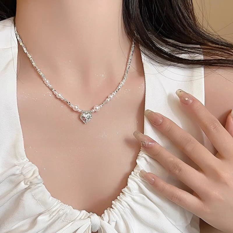 Nicho High-End sentimento quebrado prata pérola amor pingente colar feminino luz Design de luxo clavícula corrente All-M