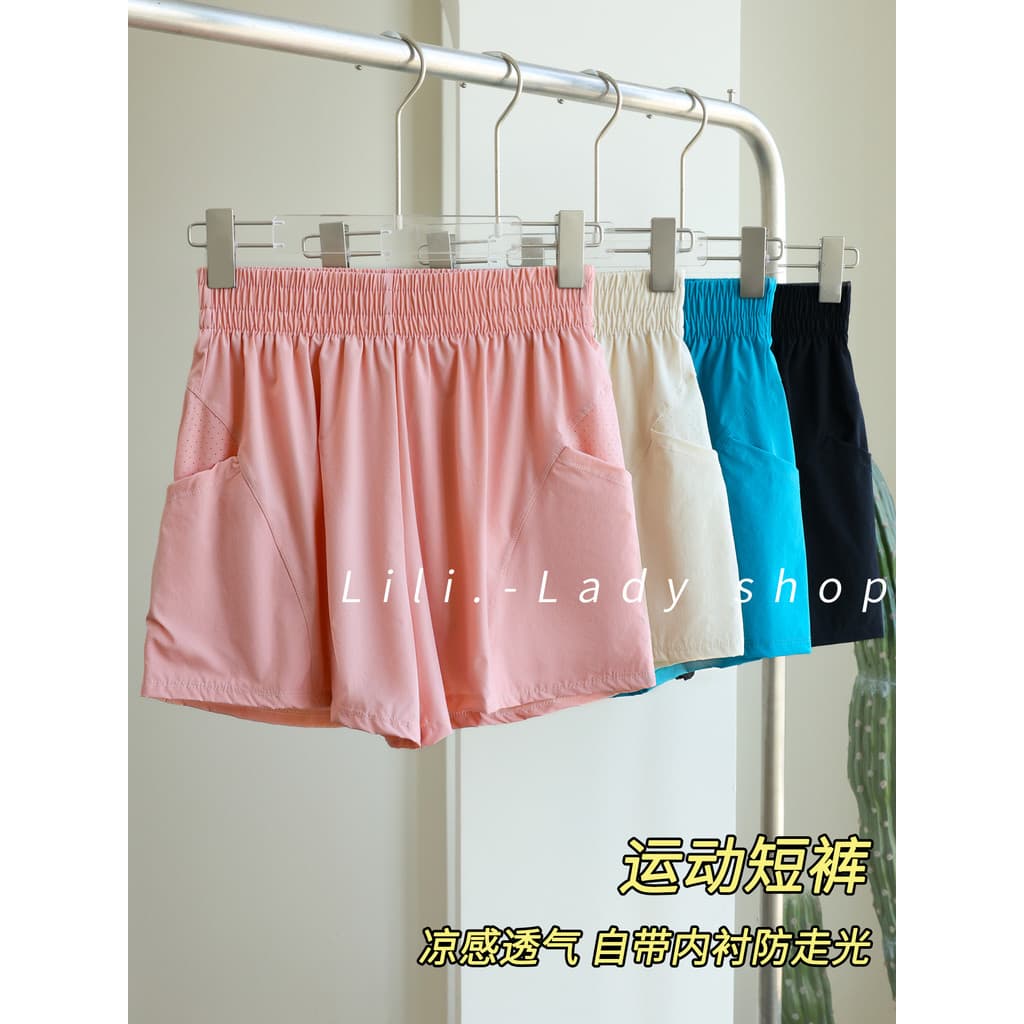 Esportes de secagem rápida shorts feminino novo estilo de Fitness wear calças de três pontos profissional correndo short