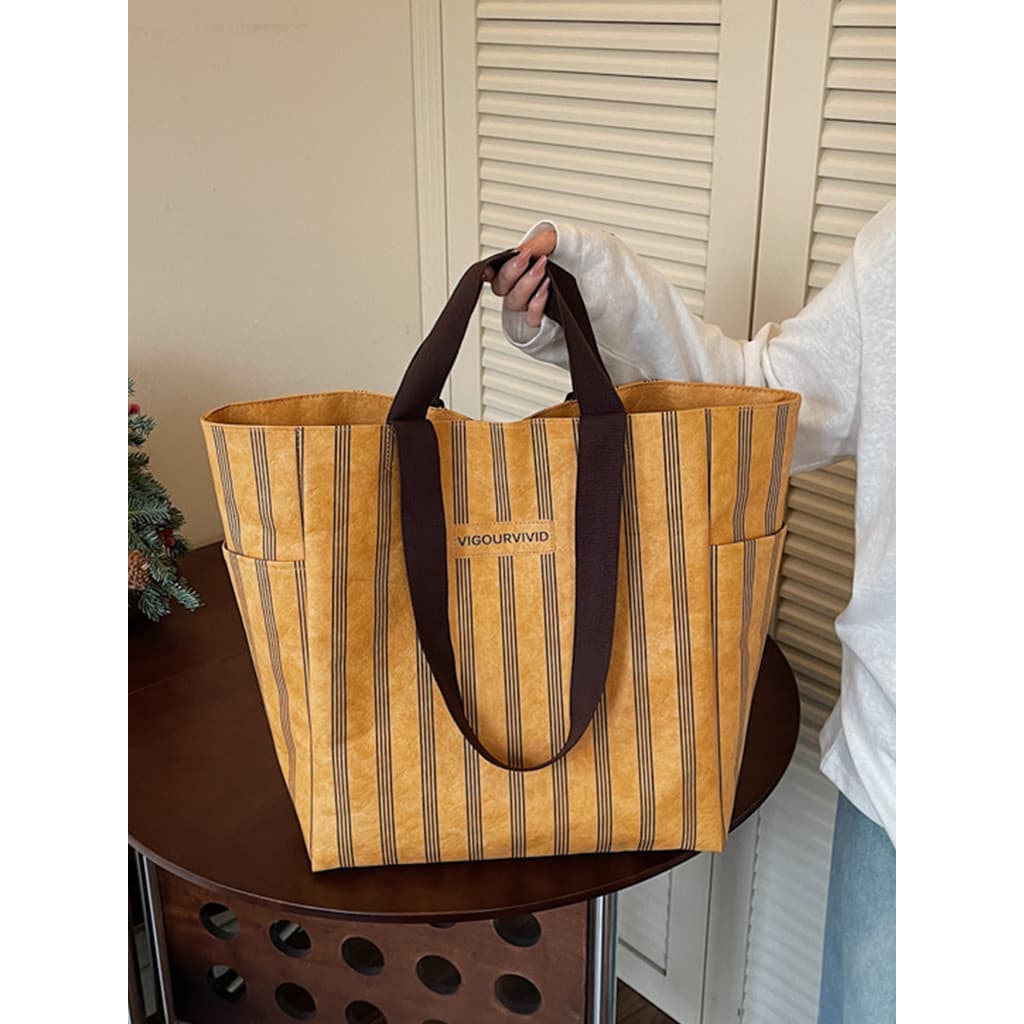 2026 verão novo estilo saco feminino sacola listras de alto valor contraste cor simples leve diário Commuter bolsa