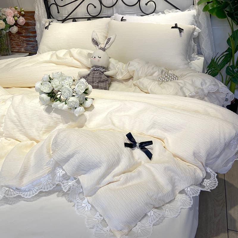 Estilo coreano leite Huhu estilo princesa fio enrugado laço arco Super macio folha de cama conjunto de quatro peças meni