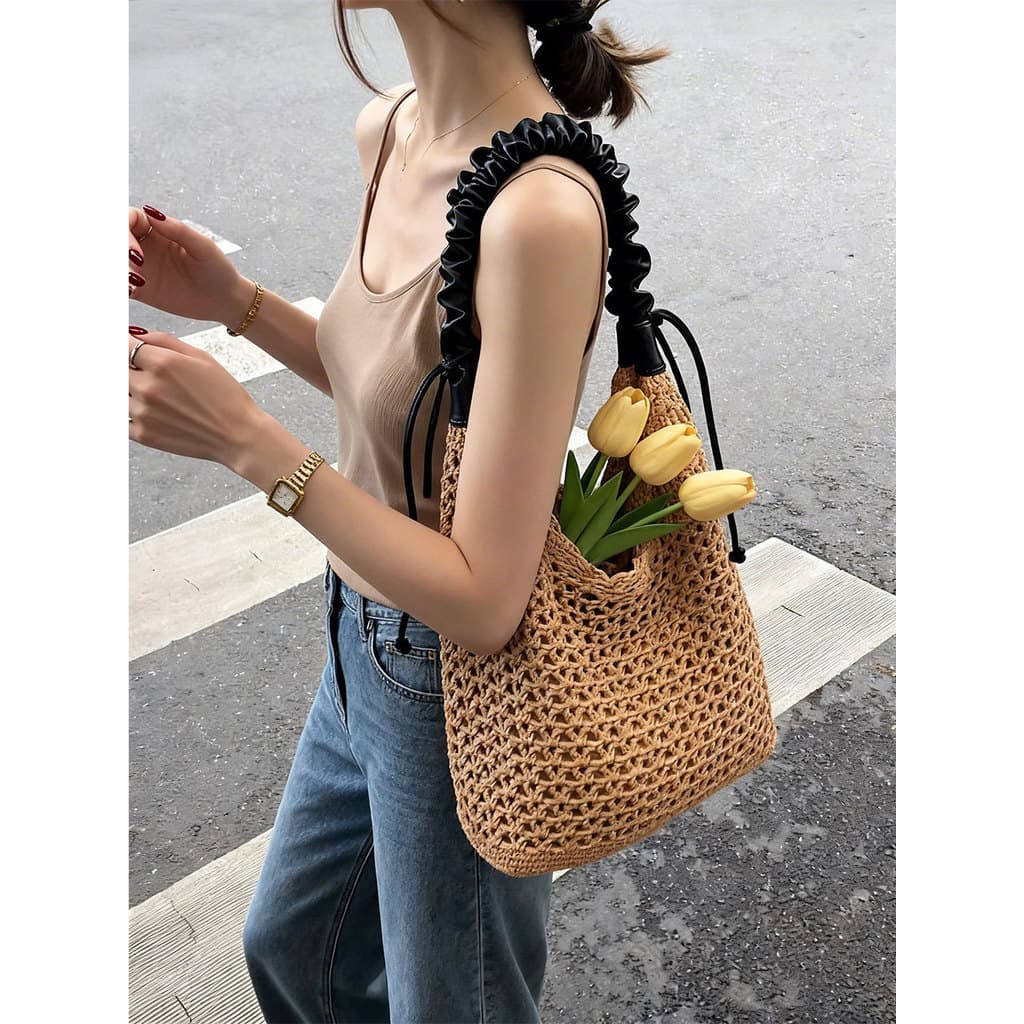 G Linda bolsa balde de tecido de verão feminina 2026 novo estilo estilo férias bolsa de ombro oca de palha