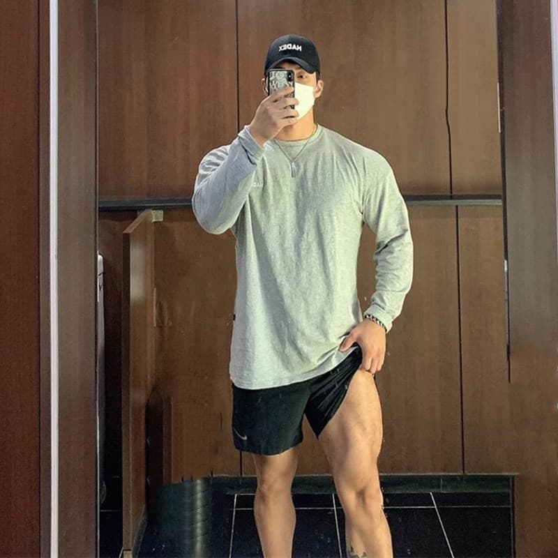 Primavera outono esportes de manga comprida homens correndo solto tamanho grande camiseta de Fitness em torno do pescoço