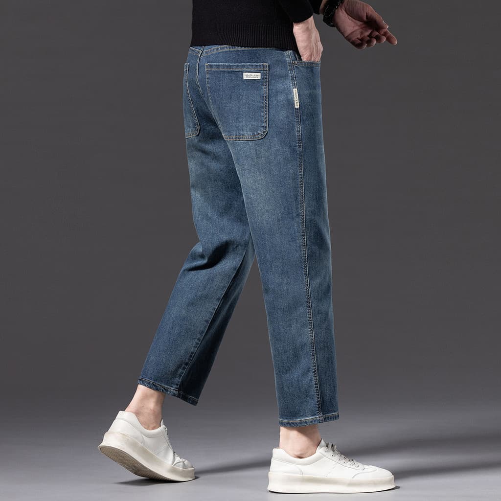 Jeans pequenos de oito pontos outono novo estilo masculino solto em linha reta perna larga estiramento Casual All-match