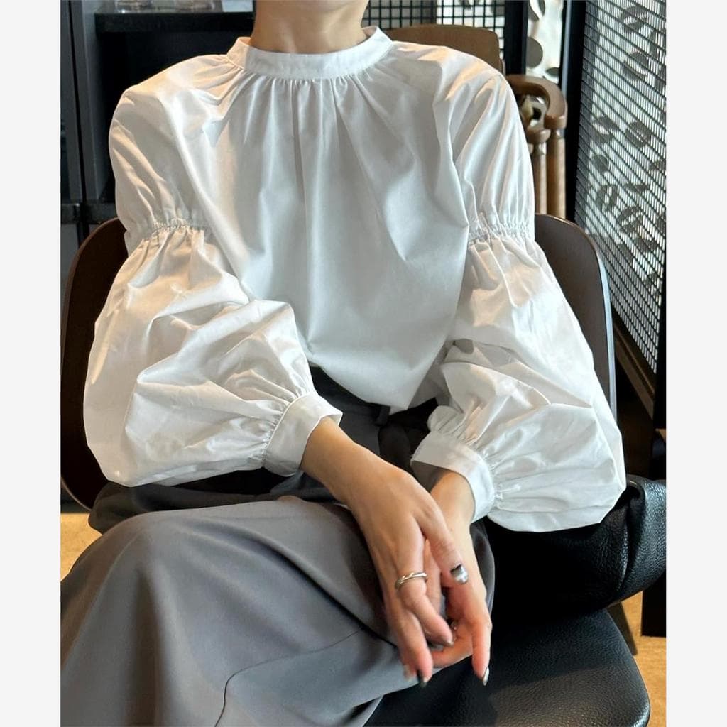 2024 primavera nova francesa Retro lanterna manga camisa branca Design feminino nicho solto camisa Commuter