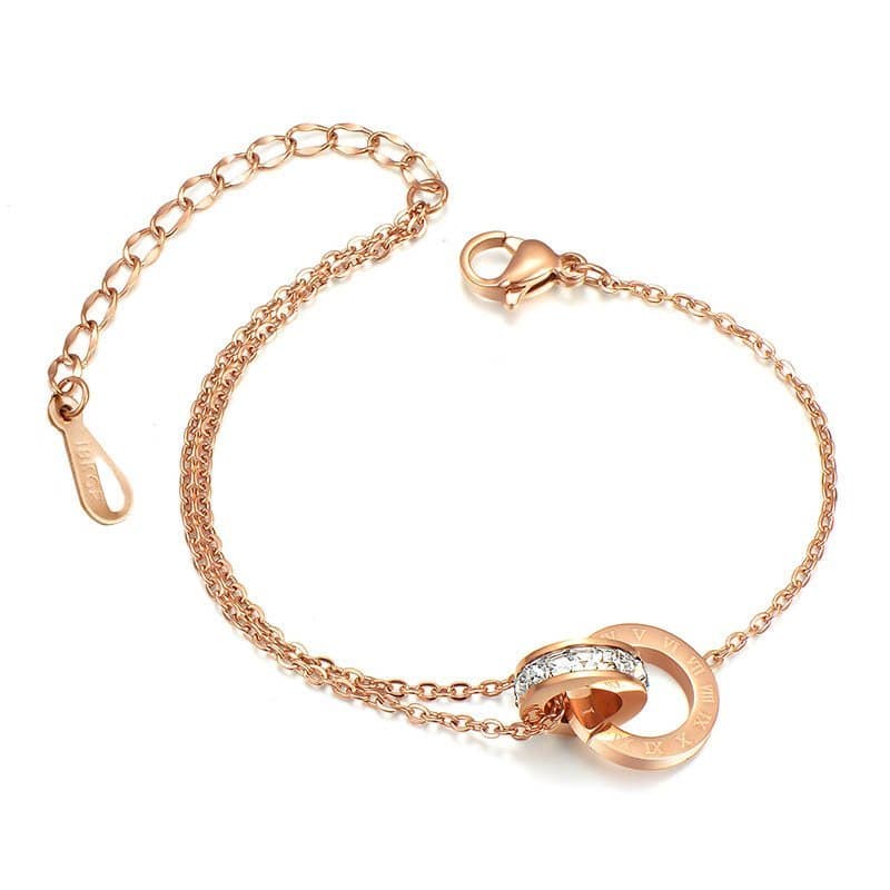 Pulseira feminina de aço inoxidável com anel duplo de aço de titânio e diamante entrelaçado com numerais romanos.