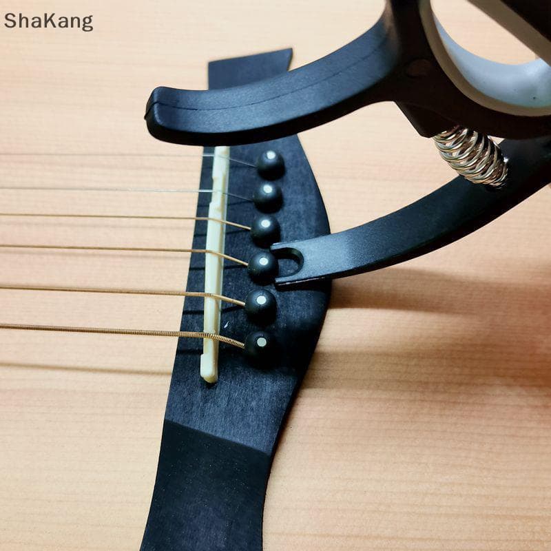 Capo De Guitarra Universal SKMY , ABS + Braçadeira De Metal Para Guitarras Acústicas/Elétricas SKK