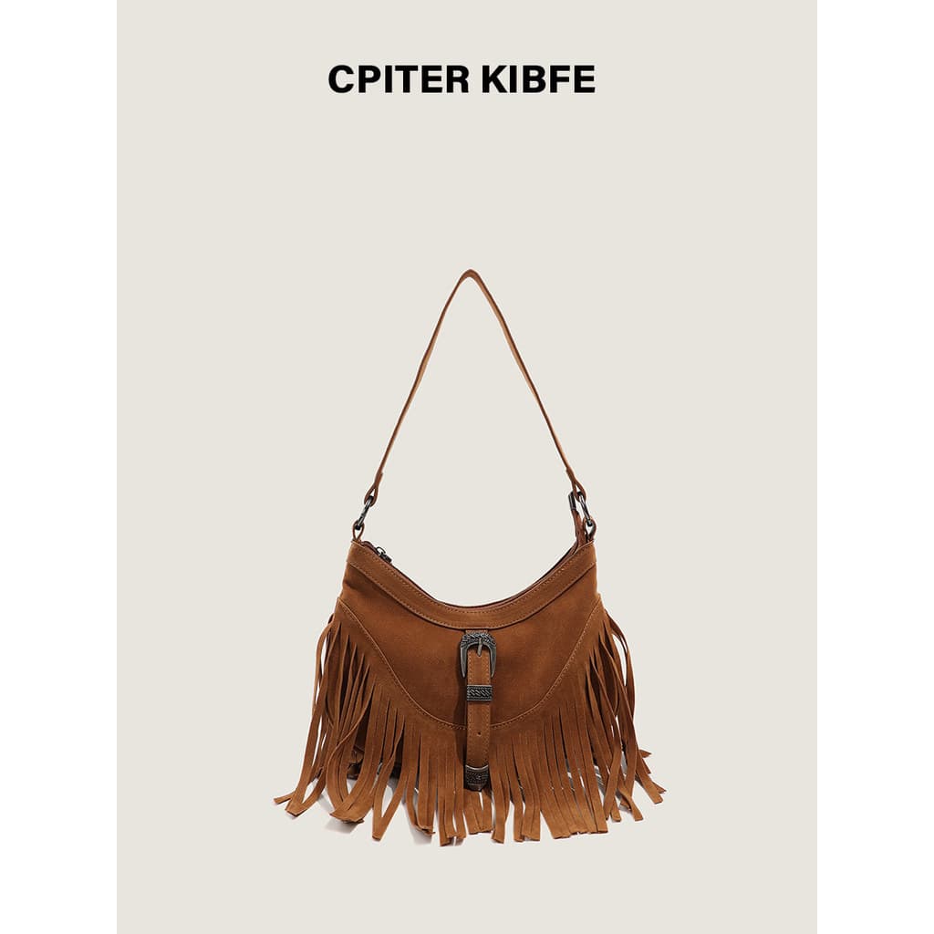 Bolsa bolsa transversal feminino Original Retro camurça borla sela saco outono inverno nicho axilas saco High-End ociden