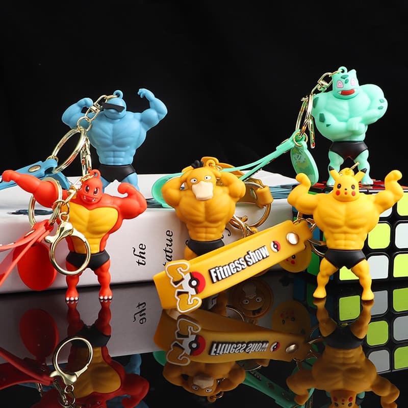 Chaveiros com pingentes de PVC com personagens Pokémon: Pikachu, Charmander, Snorlax, Squirtle e Psyduck.