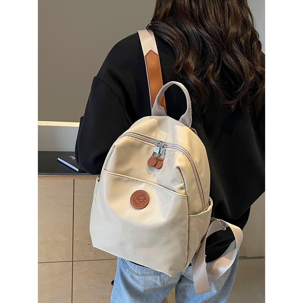Mochila feminina 2026 novo estilo primavera viagem ao ar livre Commuter mochila pequena viagem luz lazer mochila feminin