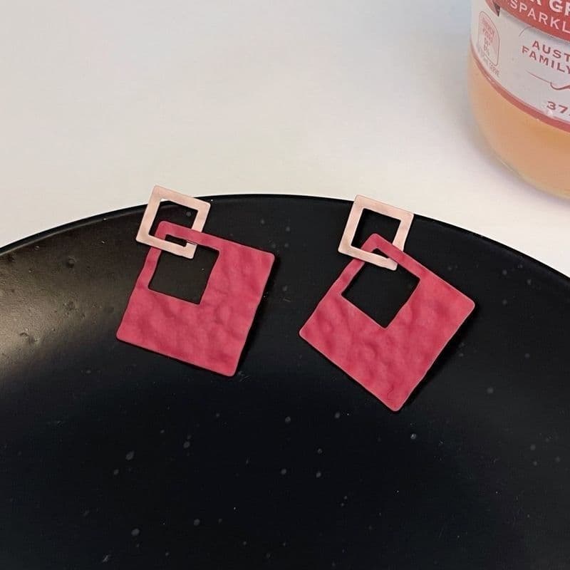 Brincos geométricos ocos rosa doce