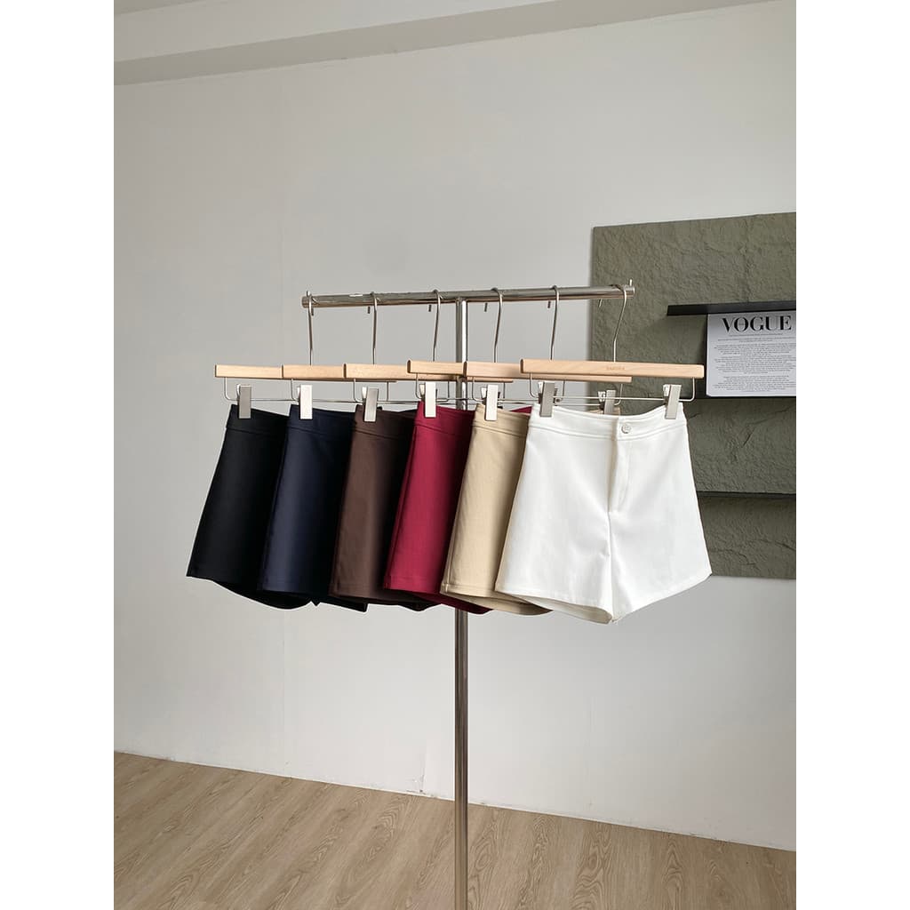2025 outono novo estilo versão coreana moda cor sólida simples All-Match Shorts casuais feminino mais magro olhar quente