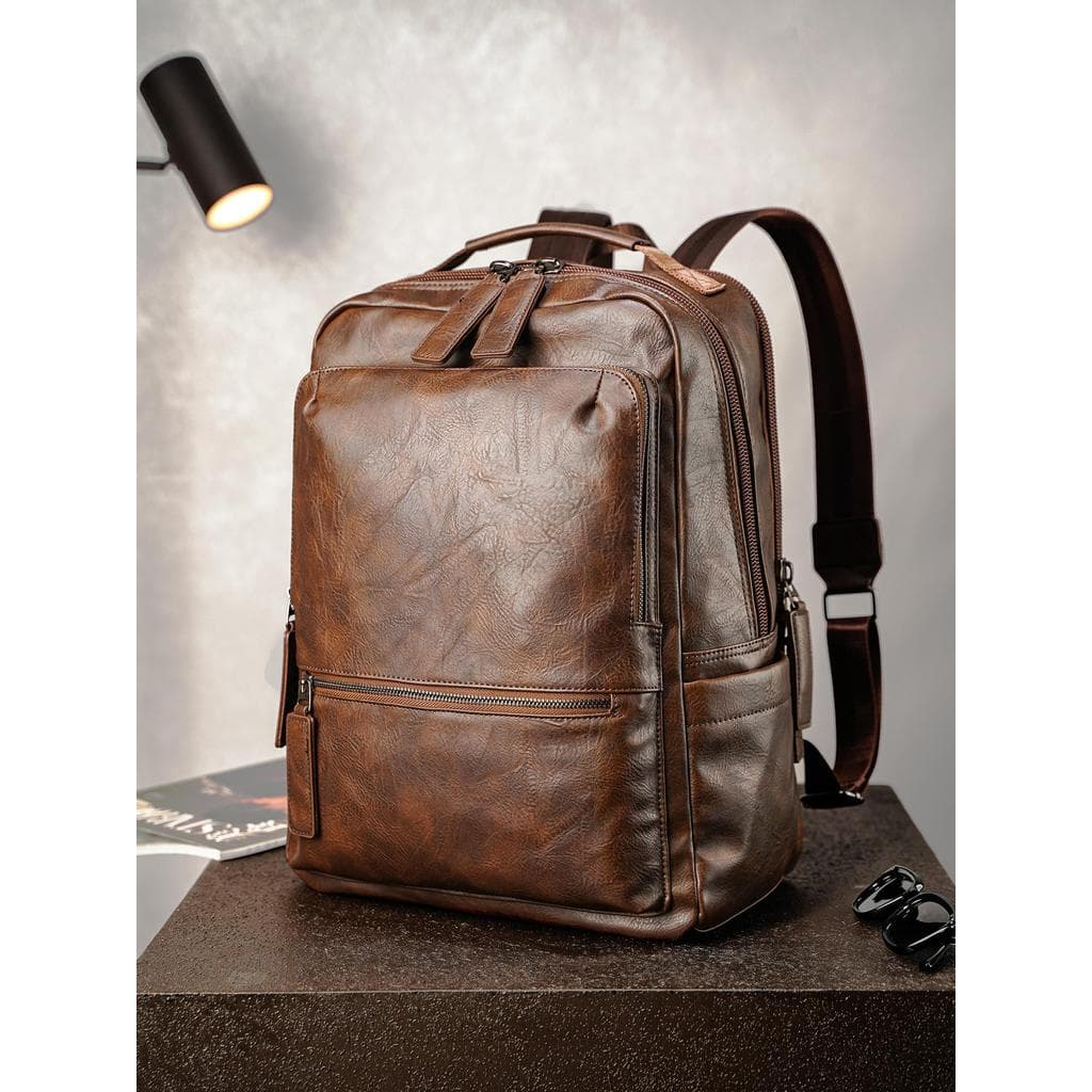 Couro genuíno Retro Street Wear mochila masculina Commuter ao ar livre mochila simples moda mochila saco de escola saco
