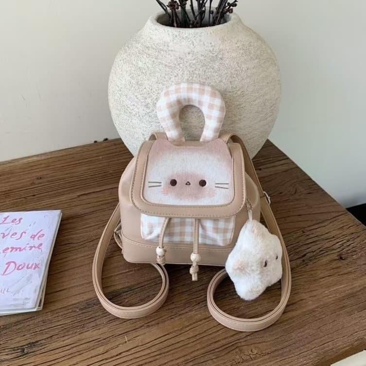 Bonito brinde gatinho mochila feminina 2026 novo estilo nicho estilo Preppy mochila All-Match portátil Commuter saco de