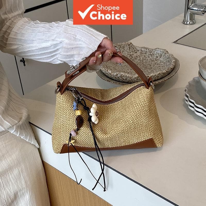 Bolsa tiracolo de nicho de alta qualidade para uso casual, portátil e retrô, bolsa de palha feminina elegante/bolsa de