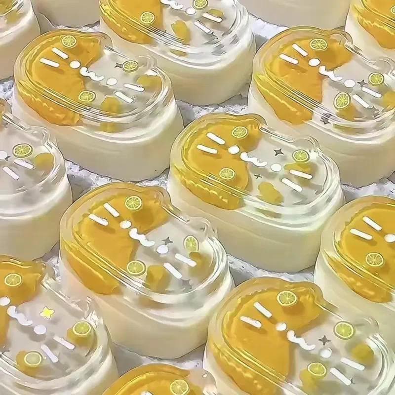 Novo pequeno livro vermelho transparente laranja gatinho meio cozido queijo diy bonito beliscando lama brinquedo ventila