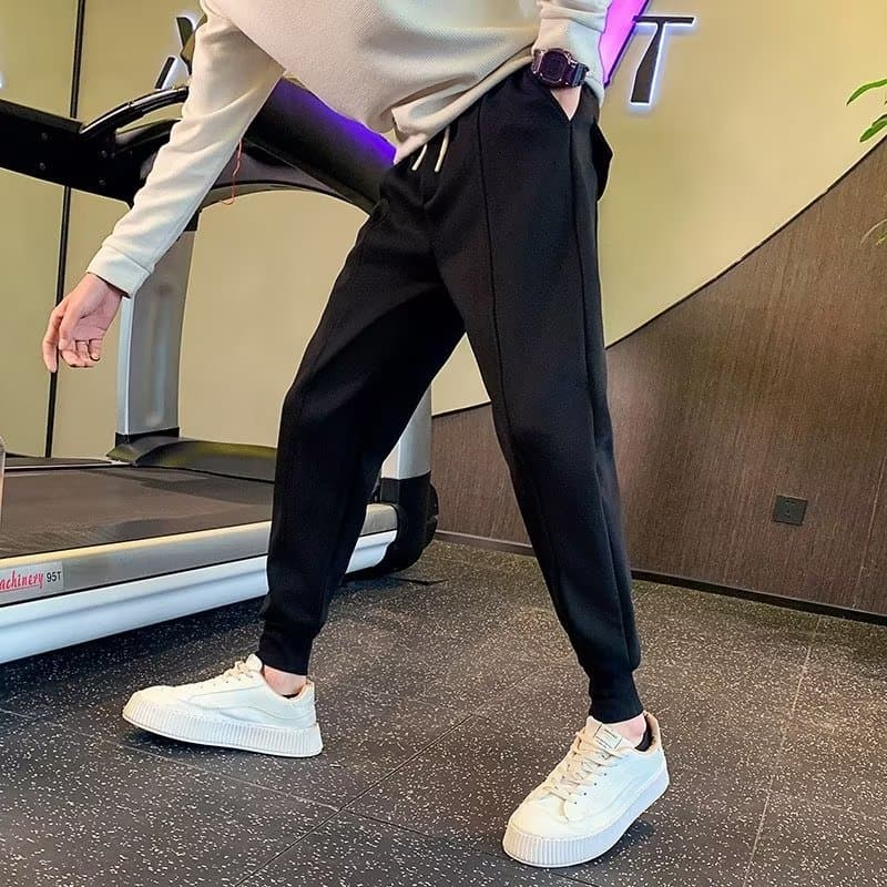 Primavera na moda novo estilo calças casuais masculinas All-Match harem calças de cor sólida calças esportivas rufião bo